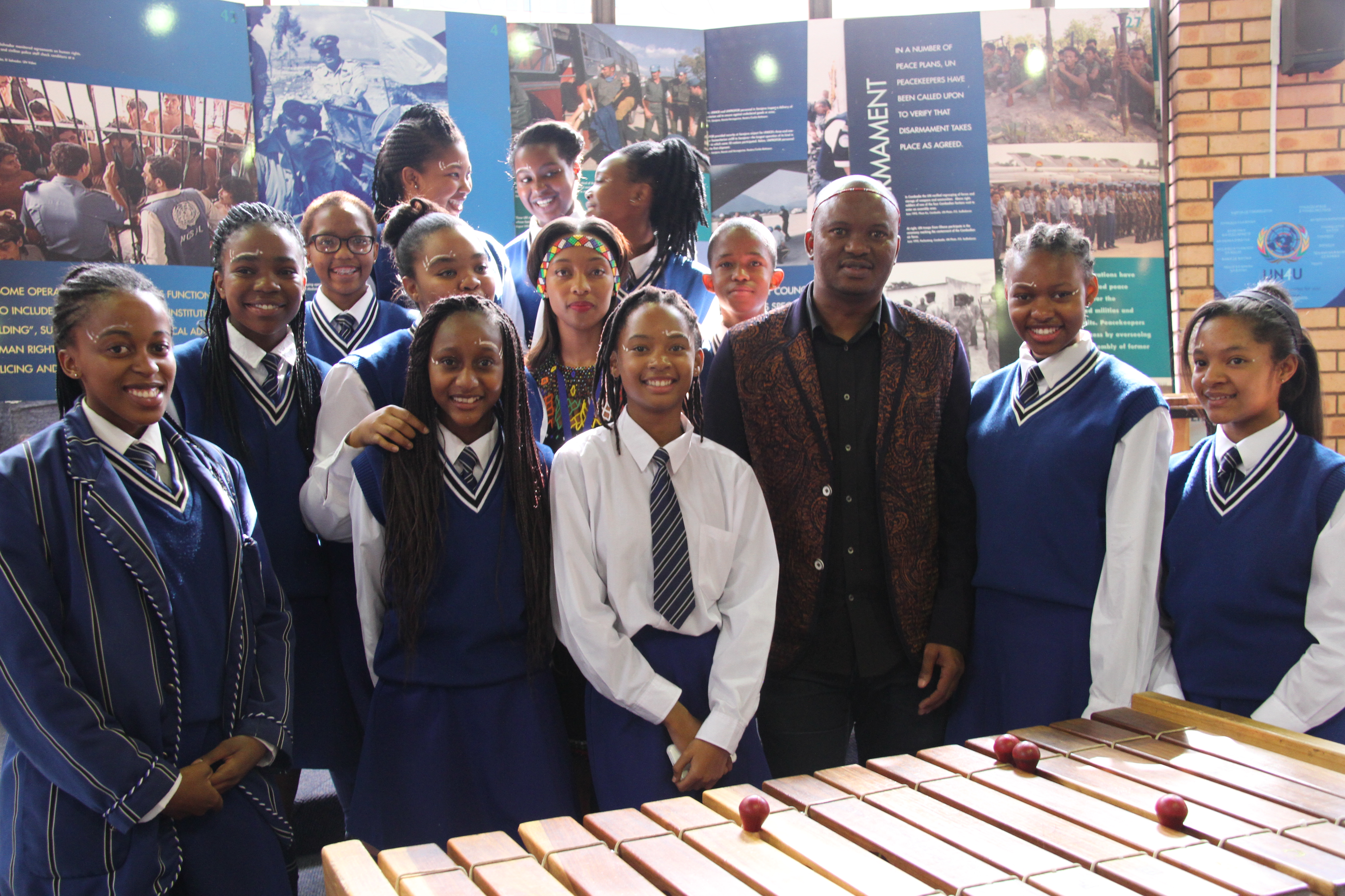 Zolani Mkhiva with the vibrant Dominican Convent School marimba band.