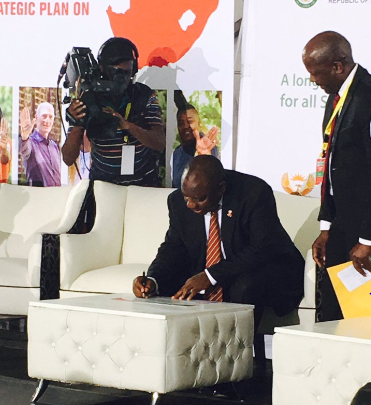 The Deputy President signing the NSP pledge